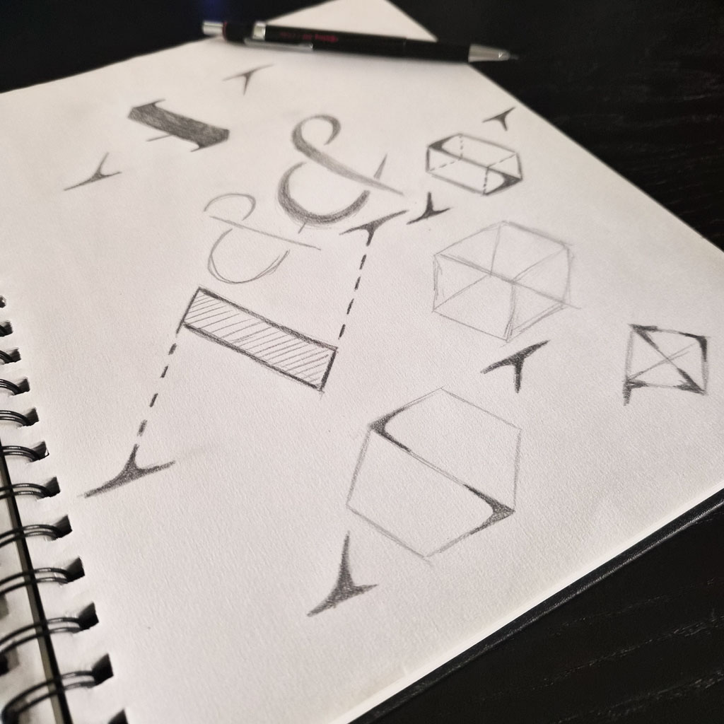 Adler & Voss logo sketches, the A and V monogram in pencil