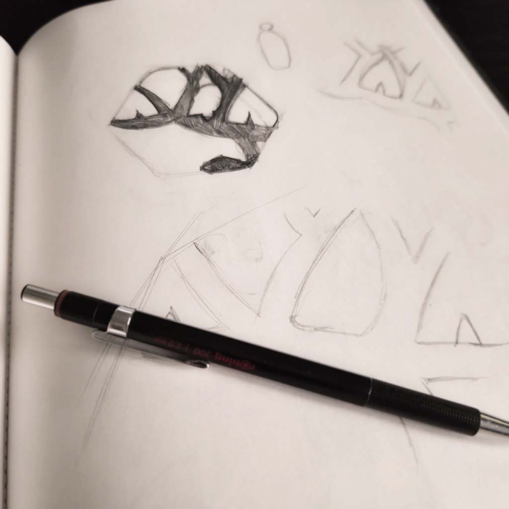 Natura Camping logo sketches
